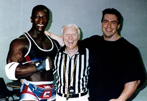 John Anderson referee from television programme Gladiators with Shadow and Trojan John Anderson referee from television programme Gladiators with Shadow and Trojan