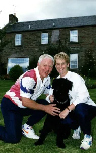 John Anderson Referee from the television programme Gladiators with wife Dorothy John Anderson Referee from the television programme Gladiators with wife Dorothy