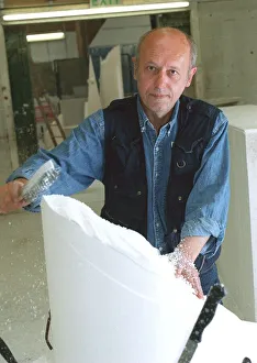 John Blakeley movie special effect sculptor July 1999 working on a polystryrene John Blakeley movie special effect sculptor July 1999 working on a polystryrene
