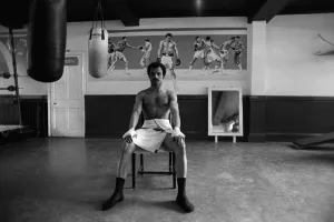 John Conteh in his boxing club having a rest from training John Conteh in his boxing club having a rest from training