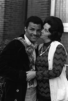 John Conteh gets a kiss from his mother after winning the British John Conteh gets a kiss from his mother after winning the British