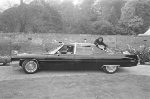 John Entwistle of the rock group The Who shows off his new car at the home of Keith Moon John Entwistle of the rock group The Who shows off his new car at the home of Keith Moon