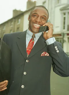 John Fashanu TV Presenter arrives at Wichester Crown Court today on his mobile phone John Fashanu TV Presenter arrives at Wichester Crown Court today on his mobile phone