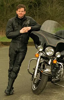 John Gordon Sinclair actor beside his Harley Davidson Electra Glide motorcycle John Gordon Sinclair actor beside his Harley Davidson Electra Glide motorcycle