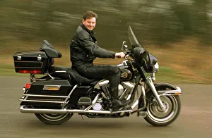 John Gordon Sinclair actor riding his Harley Davidson Electra Glide motorcycle John Gordon Sinclair actor riding his Harley Davidson Electra Glide motorcycle