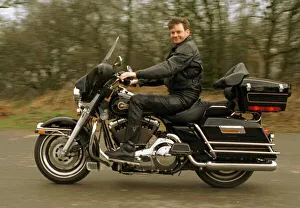 John Gordon Sinclair polishing his Harley Davidson Electra Glide motorbike March 1997 John Gordon Sinclair polishing his Harley Davidson Electra Glide motorbike March 1997