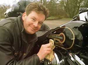 John Gordon Sinclair polishing his Harley Davidson March 1997 John Gordon Sinclair polishing his Harley Davidson March 1997