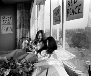 John Lennon and his wife Yoko Ono are having a weeks love-in their room at the Hilton John Lennon and his wife Yoko Ono are having a weeks love-in their room at the Hilton