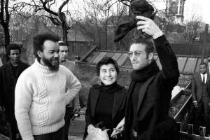 John Lennon and Yoko pictured on the roof of Black House in Holloway Road, with Michael X John Lennon and Yoko pictured on the roof of Black House in Holloway Road, with Michael X