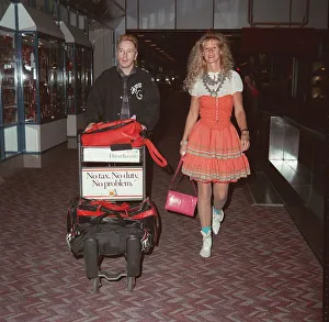 John Lydon singer of Public Image and wife Nora at London Airport, May 1990 John Lydon singer of Public Image and wife Nora at London Airport, May 1990