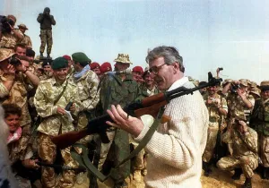 John Major MP in kuwait holding a russian made rifle John Major MP in kuwait holding a russian made rifle