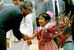 John Major is presented with flowers during his visit to China 1991 John Major is presented with flowers during his visit to China 1991