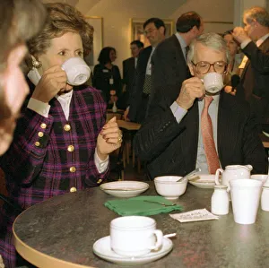 John Major Prime Minister and his wife Norma Major drink cups of tea in unison in a John Major Prime Minister and his wife Norma Major drink cups of tea in unison in a