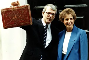 John Major seen here as Chancellor holding up the red budget box with wife Norma Major John Major seen here as Chancellor holding up the red budget box with wife Norma Major