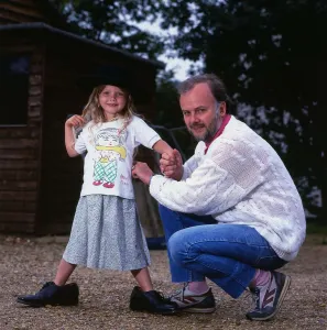 John Peel DJ Disc Jockey July 1987 with one of his children Florence John Peel DJ Disc Jockey July 1987 with one of his children Florence
