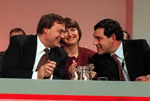 John Prescott talks to Gordon Brown with Harriet Harman centre on the platform at th John Prescott talks to Gordon Brown with Harriet Harman centre on the platform at th