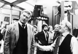 John Wayne is only joking with Richard Attenborough after a punch had been thrown in John Wayne is only joking with Richard Attenborough after a punch had been thrown in