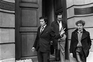 Johnny Rotten of The Sex Pistols at court 1977 with manager Malcolm McLaren Johnny Rotten of The Sex Pistols at court 1977 with manager Malcolm McLaren