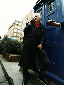 Jon Pertwee actor ex Dr Who leaning against police box like Tardis Glasgow talking Jon Pertwee actor ex Dr Who leaning against police box like Tardis Glasgow talking