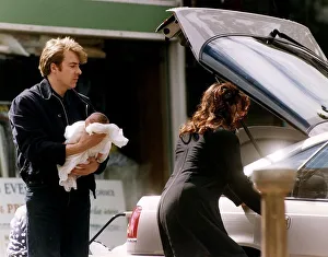 Jonathan Ross TV Presenter with wife Jane Ross holding new baby Jonathan Ross TV Presenter with wife Jane Ross holding new baby