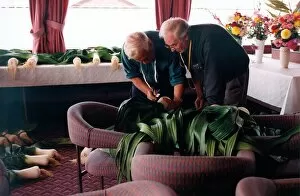 Images Dated 1st September 1997: Judges Eddy Moffatt and Joe Blakey looking and measuring the gigantic prize winning leeks