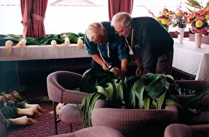 Judges Eddy Moffatt and Joe Blakey looking and measuring the gigantic prize winning leeks Judges Eddy Moffatt and Joe Blakey looking and measuring the gigantic prize winning leeks