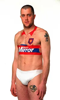 Julian Dicks of West Ham has a Daily Mirror football kit painted on to his body during Julian Dicks of West Ham has a Daily Mirror football kit painted on to his body during