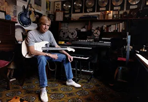 Justin Hayward lead singer of Moody Blues sits in his private recording studio at his Justin Hayward lead singer of Moody Blues sits in his private recording studio at his