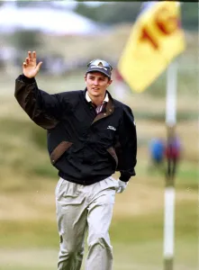 Justin Rose walks on to the 16th green to the applause of the crowd during the third Justin Rose walks on to the 16th green to the applause of the crowd during the third