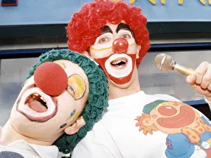 Karaoke clowns Peter Watson (right) and Stephen Brooks entertain shoppers in Stockton Karaoke clowns Peter Watson (right) and Stephen Brooks entertain shoppers in Stockton