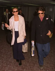 Kate Moss Model arrives at Heathrow Airport with her boyfriend Johnny Depp Actor Kate Moss Model arrives at Heathrow Airport with her boyfriend Johnny Depp Actor