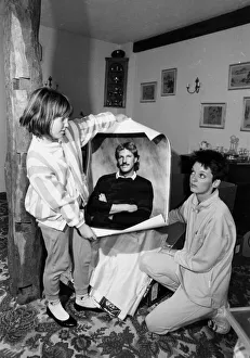 Kathy Botham and daughter Sarah holding picture of Ian Botham - October 1987 Kathy Botham and daughter Sarah holding picture of Ian Botham - October 1987