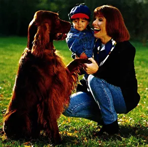 Kay Burley TV Presenter with her son Alexander and pet dog Irish Setter Fred Kay Burley TV Presenter with her son Alexander and pet dog Irish Setter Fred