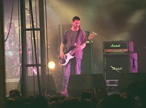 Keanu Reeves actor and musician guitarist with pop group Dogstar playing guitar on stage Keanu Reeves actor and musician guitarist with pop group Dogstar playing guitar on stage