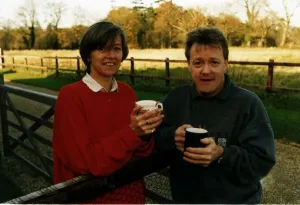 Keith Chegwin TV Presenter drinking tea outside in garden with woman name not known Keith Chegwin TV Presenter drinking tea outside in garden with woman name not known