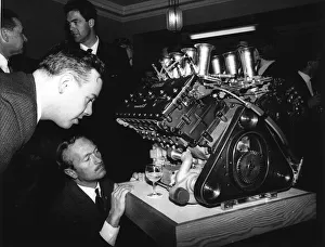 Keith Dickworth April 1967 who designed the engine and Colin Chapman look at the new Keith Dickworth April 1967 who designed the engine and Colin Chapman look at the new