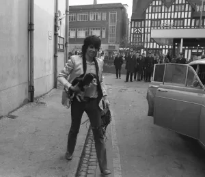 Keith richards arrives at Coventry Theatre carrying a young King Charles Spaniel under Keith richards arrives at Coventry Theatre carrying a young King Charles Spaniel under