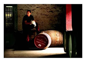 Kenny Matthews with a special whisky cask, produced by North British Distillery in Kenny Matthews with a special whisky cask, produced by North British Distillery in