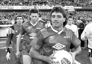 Kevin Keegan, followed by Chris Waddle and Peter Shilton, leads out his team at St Kevin Keegan, followed by Chris Waddle and Peter Shilton, leads out his team at St