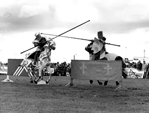 Knights on horseback clash at a jousting tournament in June 1984 Knights on horseback clash at a jousting tournament in June 1984