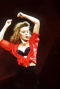 Kylie Minogue actress & singer on stage with arms in air Kylie Minogue actress & singer on stage with arms in air
