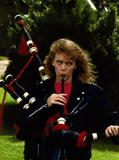 Kylie Minogue blowing into bagpipes September 1988 Kylie Minogue blowing into bagpipes September 1988