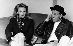 Kylie Minogue singer actress with Jason Donovan singer actor sitting on sofa Kylie Minogue singer actress with Jason Donovan singer actor sitting on sofa