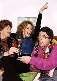 Kylie Minogue Singer Actress sitting between Simon Day (left Kylie Minogue Singer Actress sitting between Simon Day (left