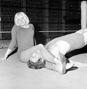 Lady wrestler Mitzi Mueller seen here taking on Colin Wills Lady wrestler Mitzi Mueller seen here taking on Colin Wills