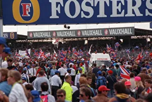 A large crowd celebrating July 1992 after Nigel Mansell had won the British Grand A large crowd celebrating July 1992 after Nigel Mansell had won the British Grand