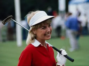 Laura Baugh golfer August 1977 Whgite skip hat red jumper golf club Laura Baugh golfer August 1977 Whgite skip hat red jumper golf club