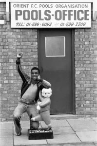 Laurie Cunningham outside Leyton Orient Football Club Pools Office Laurie Cunningham outside Leyton Orient Football Club Pools Office