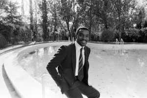 Laurie Cunningham poses for the camera near swimming pool Madrid Spain Laurie Cunningham poses for the camera near swimming pool Madrid Spain