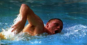 Lazio and England footballer Paul Gascoigne swimming in a pool in Rome as he battles to Lazio and England footballer Paul Gascoigne swimming in a pool in Rome as he battles to
